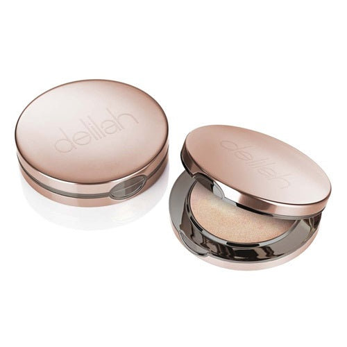 Delilah Pure Light Compact Illuminating Powder Aura 2301 highlighter